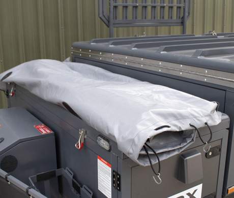 Roll ocver and stow on top of storage locker